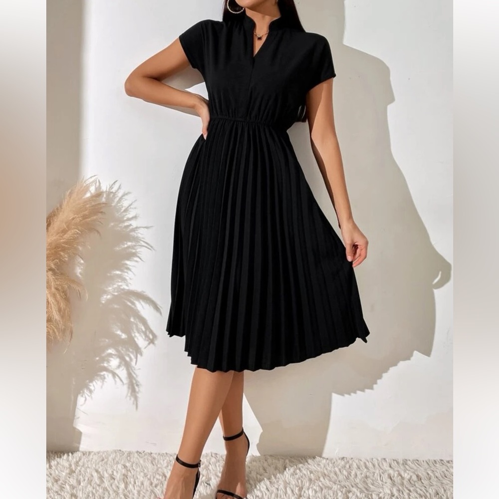 Pleated black dress